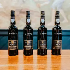 Cztery butelki wina madera Blandy's 10 Years: Malmsey, Bual, Verdelho i Sercial.