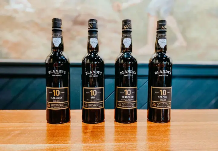 Cztery butelki wina madera Blandy's 10 Years: Malmsey, Bual, Verdelho i Sercial.