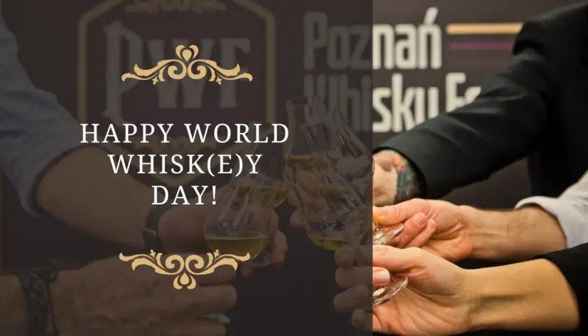 Wznosimy toasty za międzynarodowy dzień whisky! Kilka par rąk trzyma kieliszki z bursztynowym trunkiem.