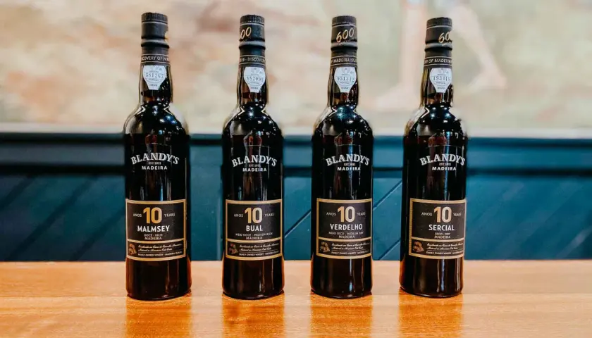 Cztery butelki wina madera Blandy's 10 Years: Malmsey, Bual, Verdelho i Sercial.